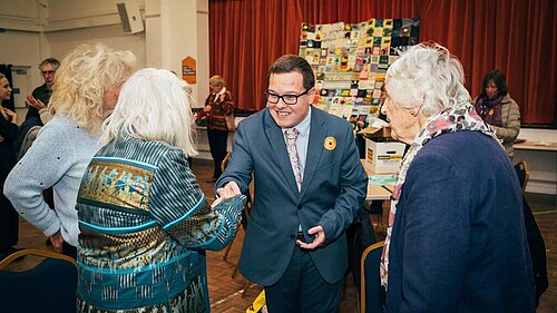 Jack Davies thanks Sway Place resident, Charmian Vilvien, for her contribution to the Quilt.